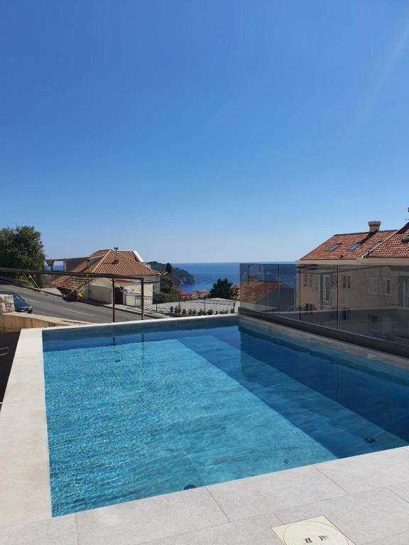 a large swimming pool on top of a building at Apartment Pero&Mika With Swimming Pool in Dubrovnik