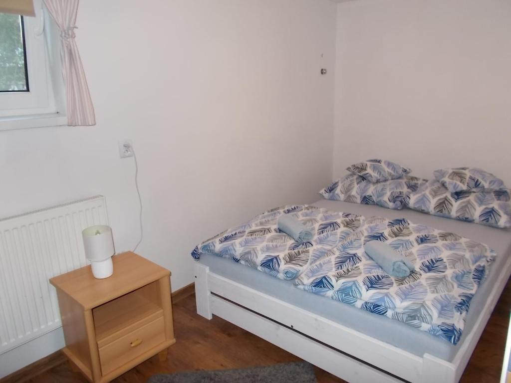 Postel nebo postele na pokoji v ubytování Noclegi u Marcela