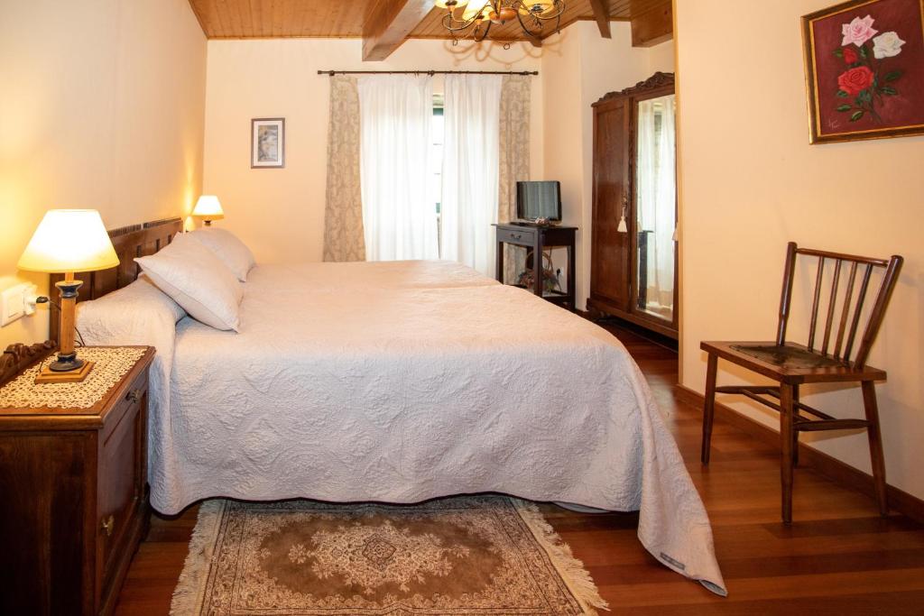 A bed or beds in a room at Casa de Barreiro