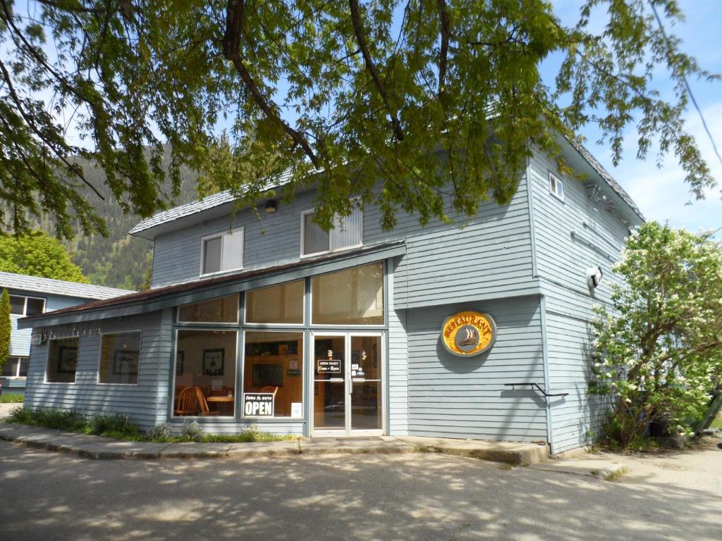 a building with a sign on the side of it at Valhalla Inn in New Denver