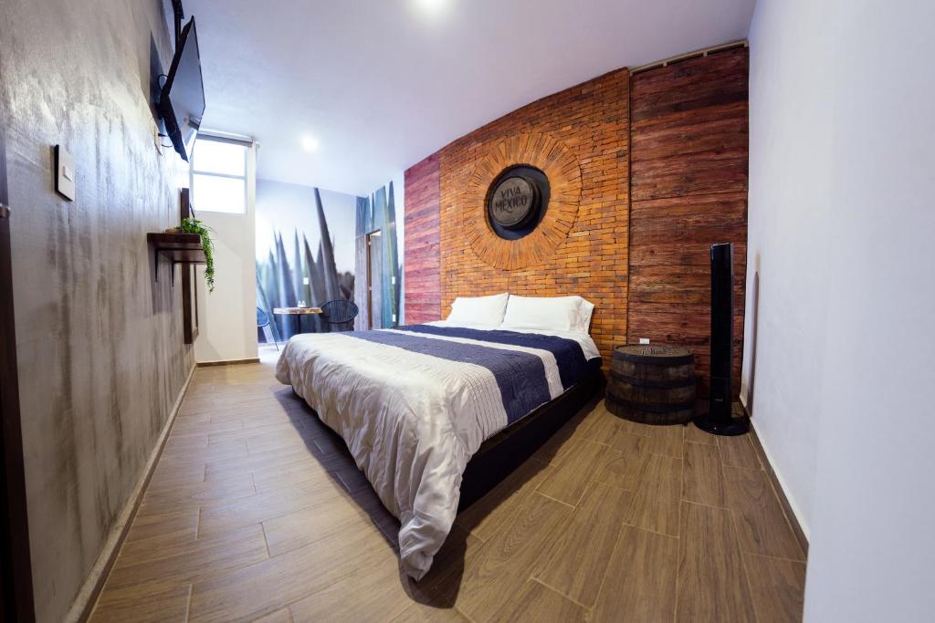 Postel nebo postele na pokoji v ubytování Coaranda Hotel Boutique
