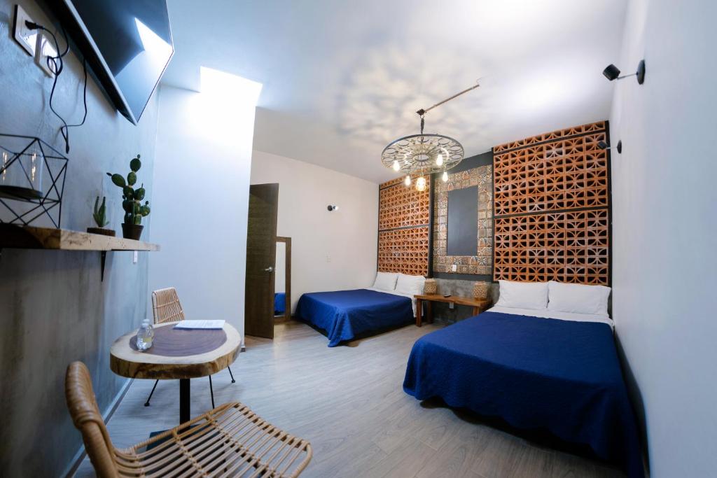 Postel nebo postele na pokoji v ubytování Coaranda Hotel Boutique