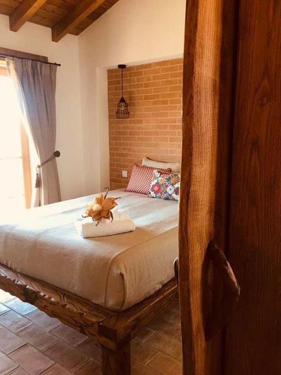 Postel nebo postele na pokoji v ubytování Monte da Boavista