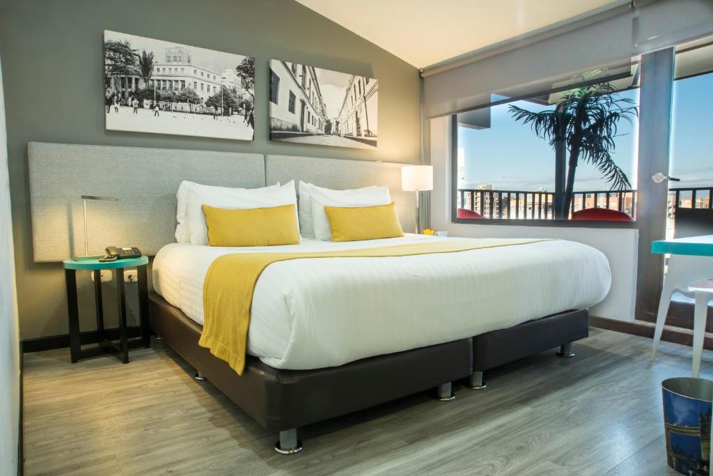 Postel nebo postele na pokoji v ubytování Hotel City Bog Usaquén