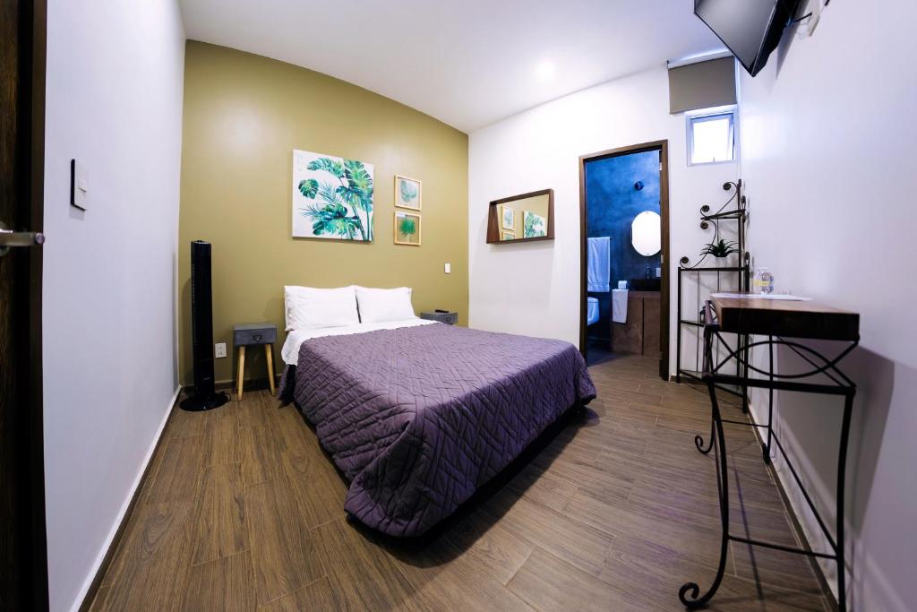 Postel nebo postele na pokoji v ubytování Coaranda Hotel Boutique