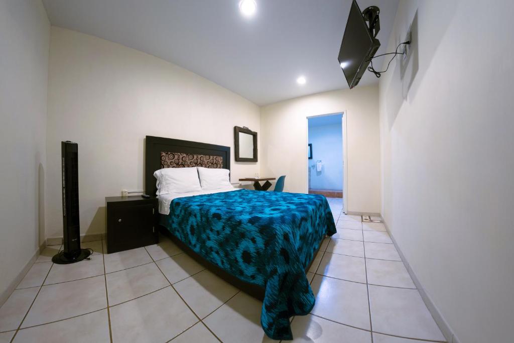 Postel nebo postele na pokoji v ubytování Coaranda Hotel Boutique