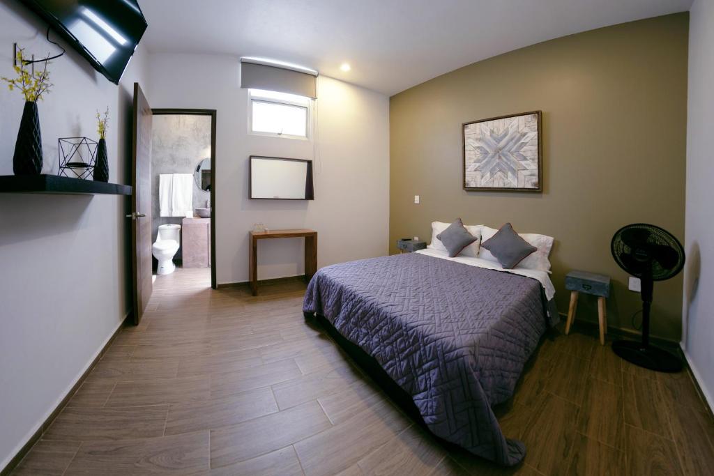 Postel nebo postele na pokoji v ubytování Coaranda Hotel Boutique