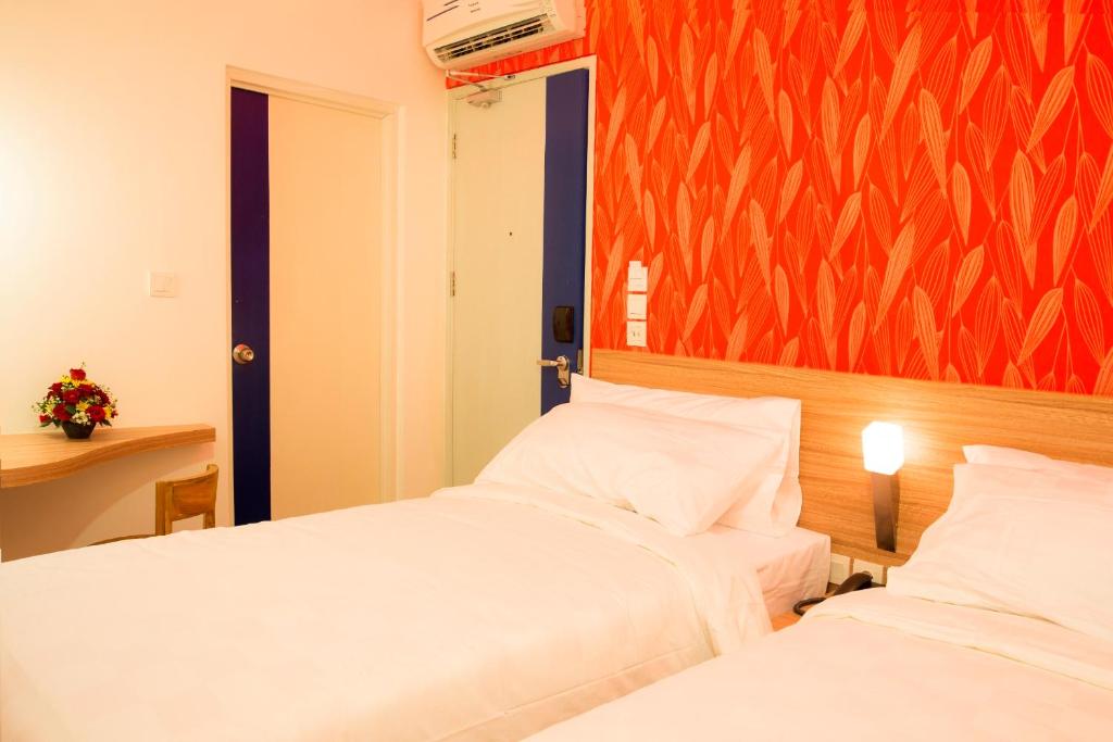 Postel nebo postele na pokoji v ubytování DeMira Hotel
