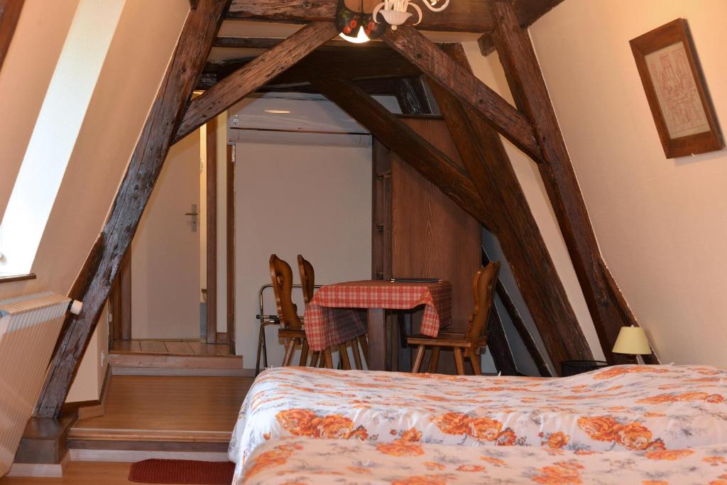 Postel nebo postele na pokoji v ubytování Hotel Restaurant Dontenville