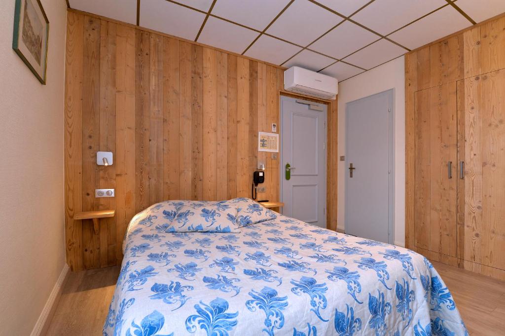 Postel nebo postele na pokoji v ubytování Hotel Restaurant Dontenville