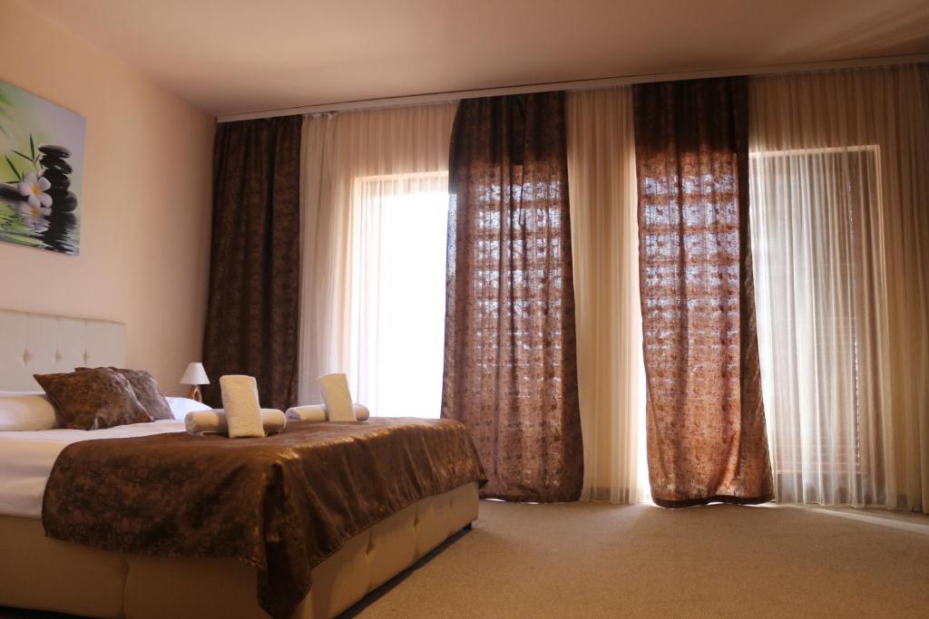 Postel nebo postele na pokoji v ubytování Garden House