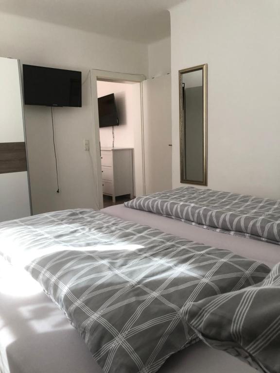 Postel nebo postele na pokoji v ubytování Ferienwohnung Top 3