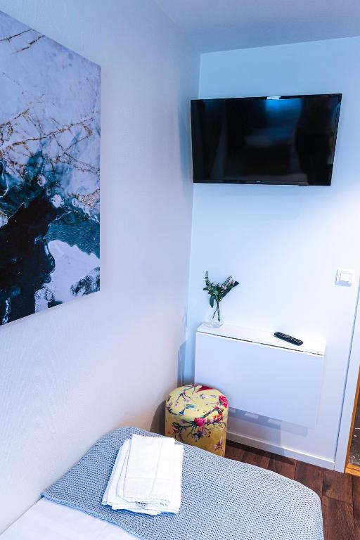 TV a/nebo společenská místnost v ubytování Hotel City Living
