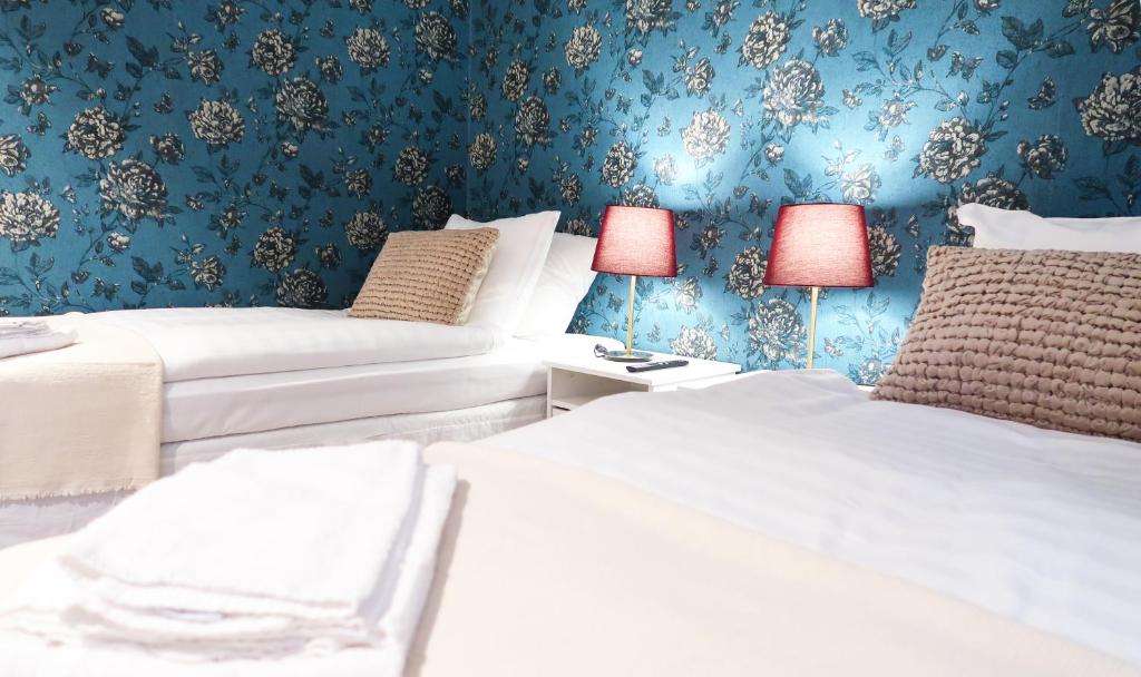 Postel nebo postele na pokoji v ubytování Hotel City Living