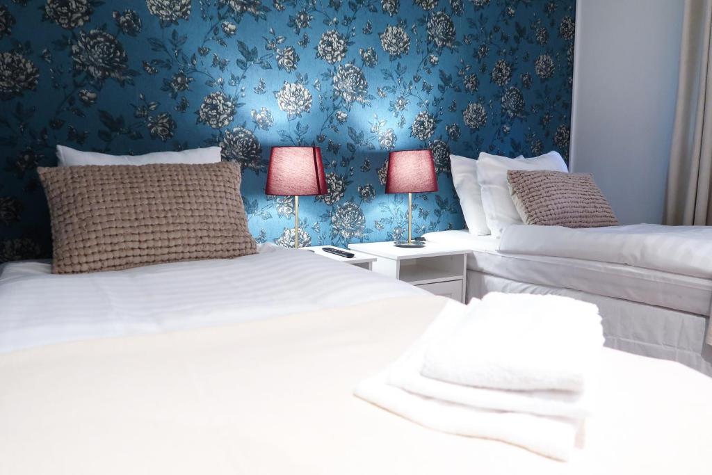 Postel nebo postele na pokoji v ubytování Hotel City Living