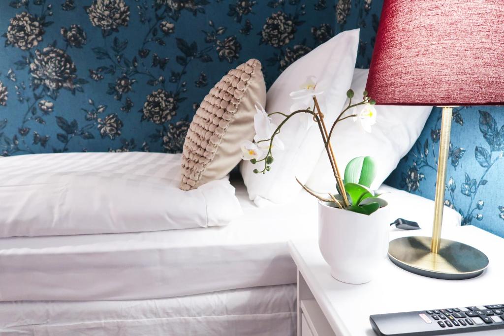 Postel nebo postele na pokoji v ubytování Hotel City Living