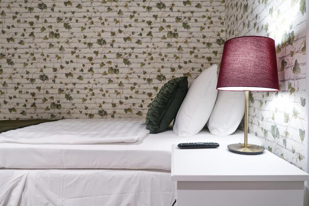 Postel nebo postele na pokoji v ubytování Hotel City Living