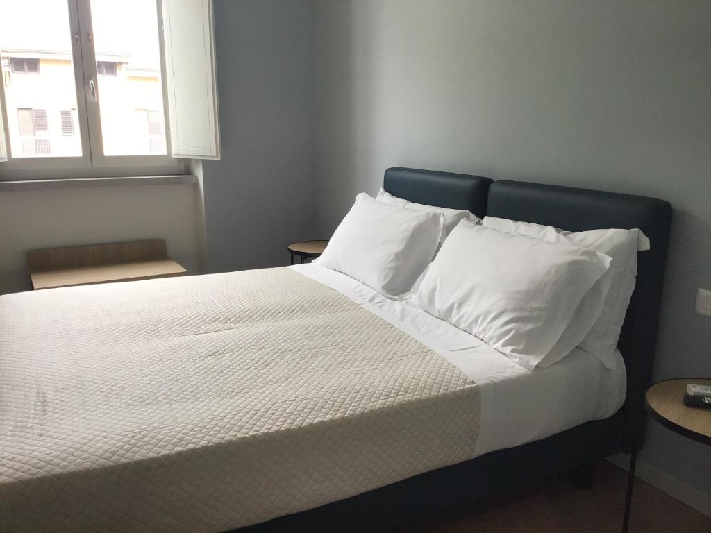 Postel nebo postele na pokoji v ubytování VILLA ACTEA
