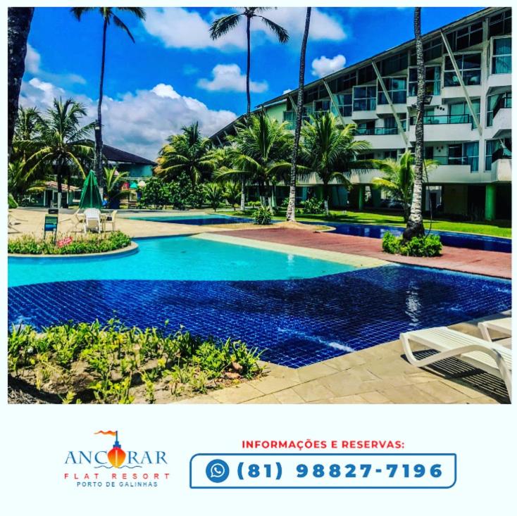 a picture of a swimming pool in front of a building at Flats de 2 Quartos no Ancorar in Porto De Galinhas