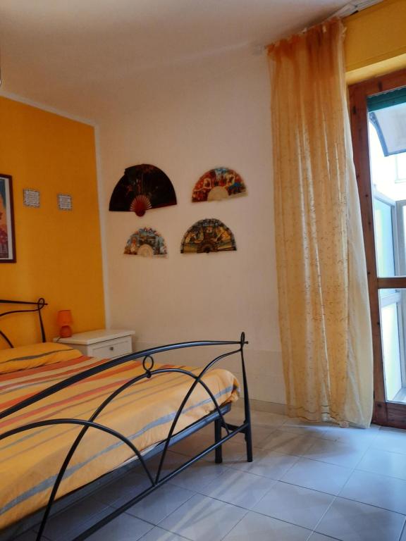 Postel nebo postele na pokoji v ubytování La casa di Carmen