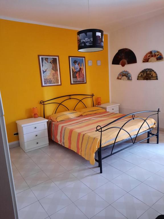 Postel nebo postele na pokoji v ubytování La casa di Carmen