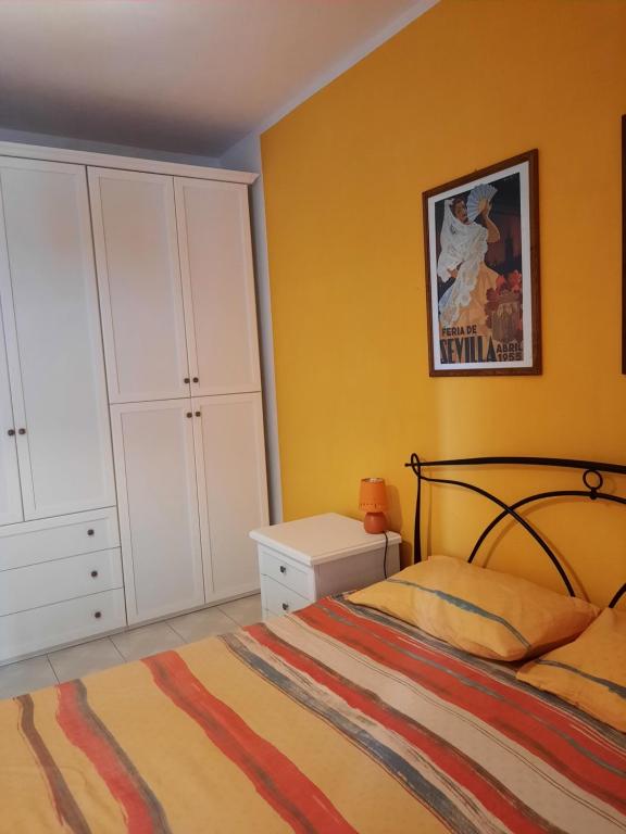 Postel nebo postele na pokoji v ubytování La casa di Carmen