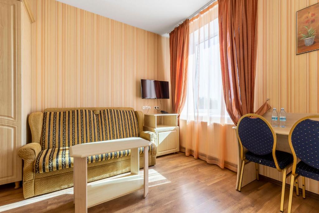 TV a/nebo společenská místnost v ubytování Гостиница Siesta Киев