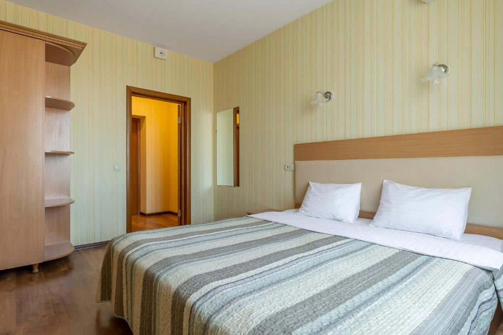 Postel nebo postele na pokoji v ubytování Гостиница Siesta Киев