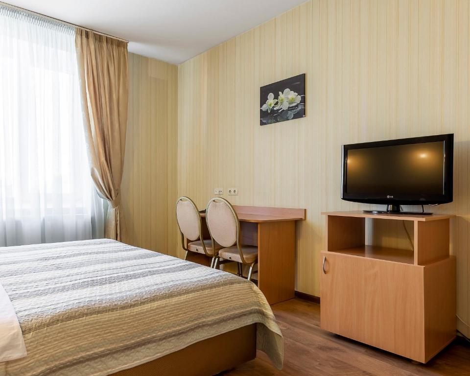 TV a/nebo společenská místnost v ubytování Гостиница Siesta Киев