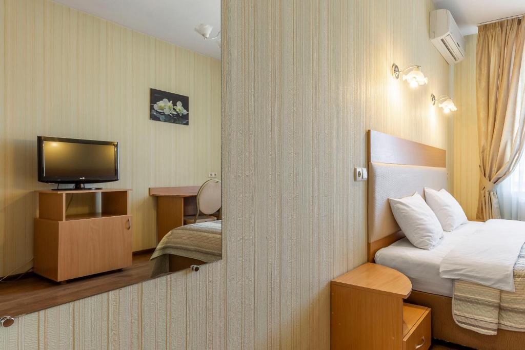 TV a/nebo společenská místnost v ubytování Гостиница Siesta Киев
