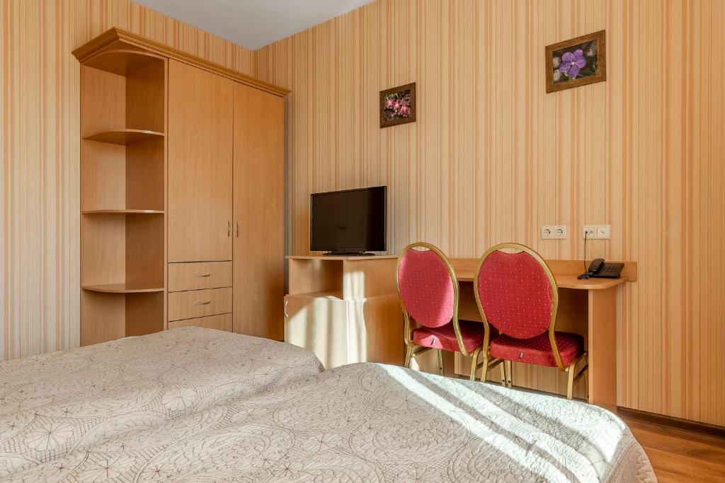 TV a/nebo společenská místnost v ubytování Гостиница Siesta Киев