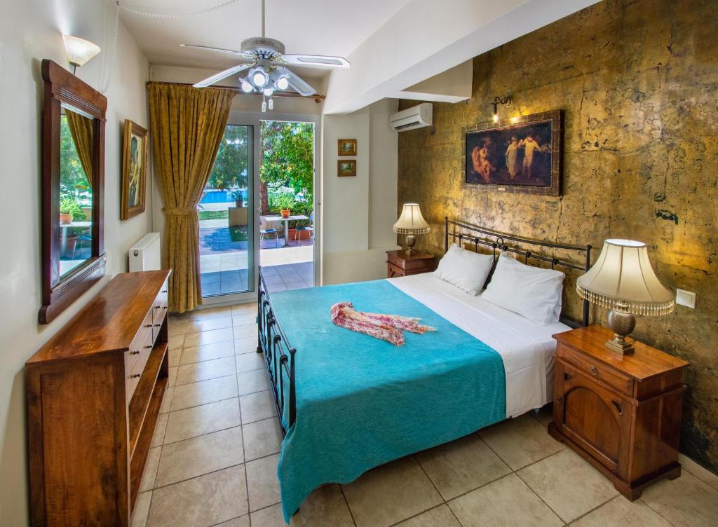 Postel nebo postele na pokoji v ubytování Lefkas Blue Residence