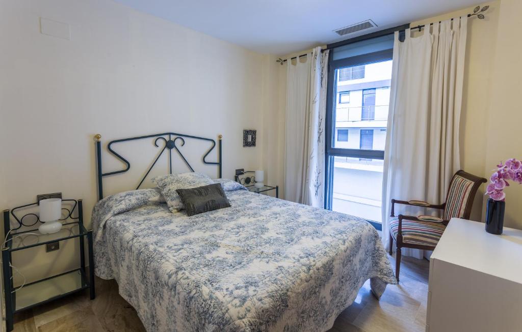 Posteľ alebo postele v izbe v ubytovaní Hauzify I Apartament Altamira