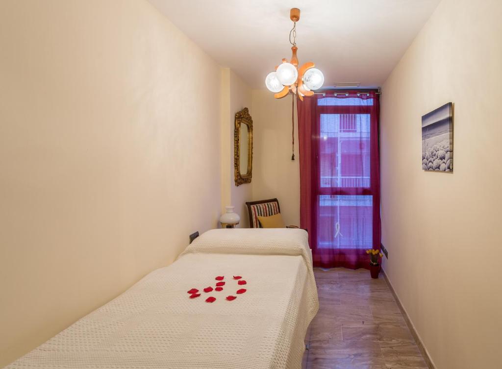 Posteľ alebo postele v izbe v ubytovaní Hauzify I Apartament Altamira