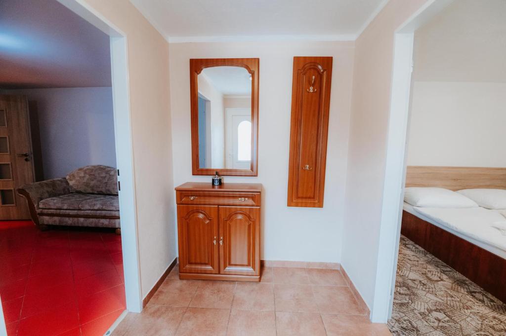 Postel nebo postele na pokoji v ubytování ARD Apartments - Levice