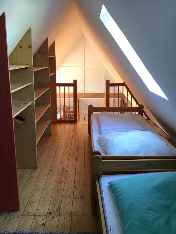 Postel nebo postele na pokoji v ubytování FeWo Spitzweg, Garlstorf - Lüneburger Heide