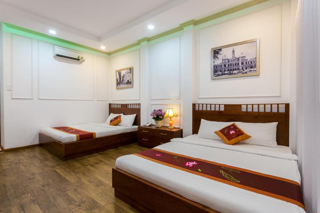 Indochine Ben Thanh Hotel & Apartments - Sala De Família Com Varanda