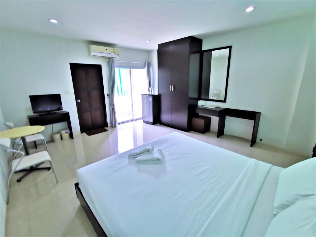 Postel nebo postele na pokoji v ubytování Hua Hin Irooms