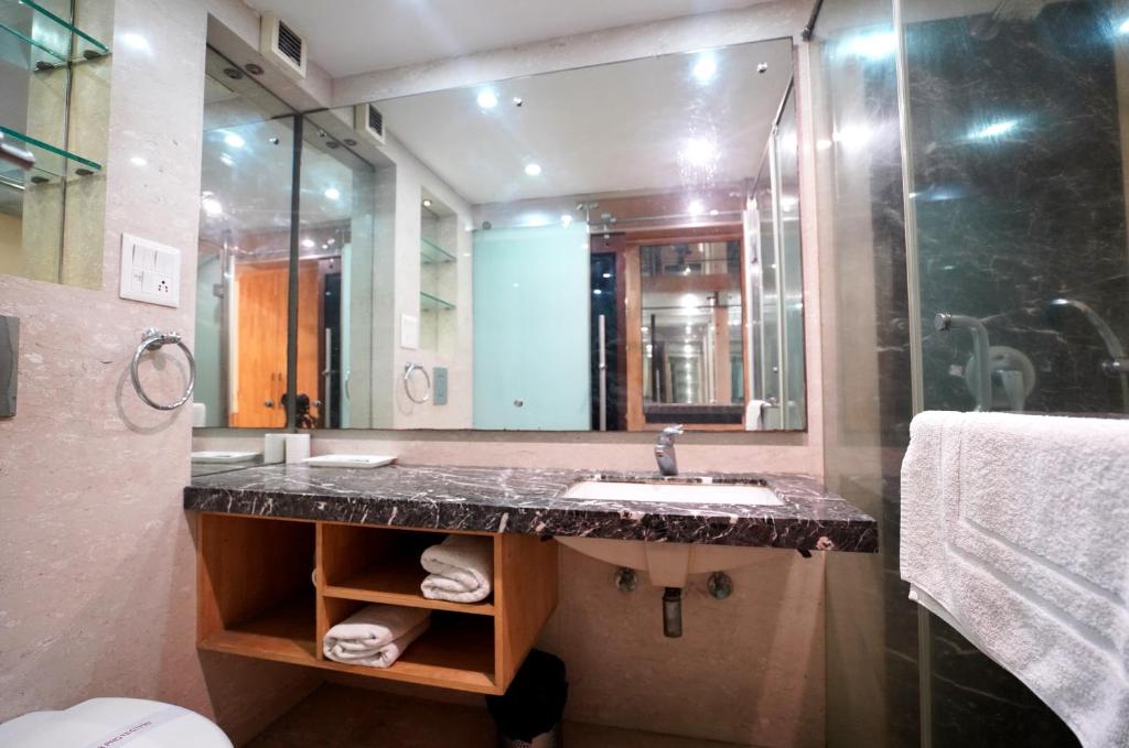 Koupelna v ubytování Airport Hotel Grand by Fantasia