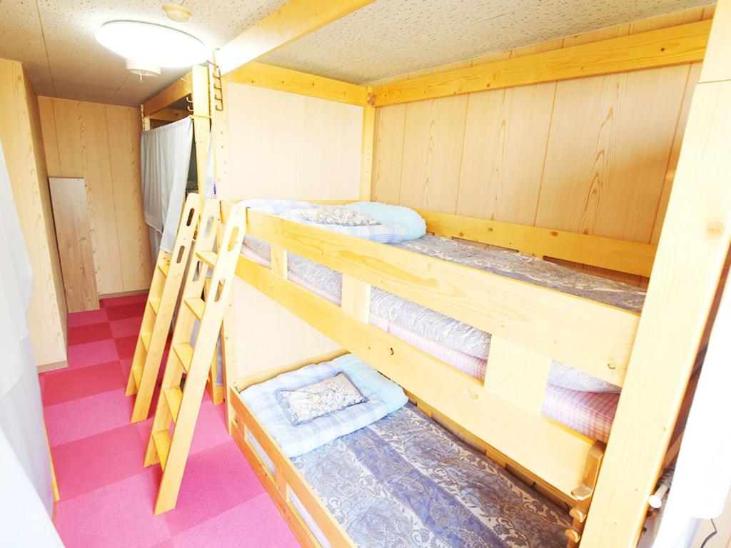 Postel nebo postele na pokoji v ubytování Hostel J Culture168