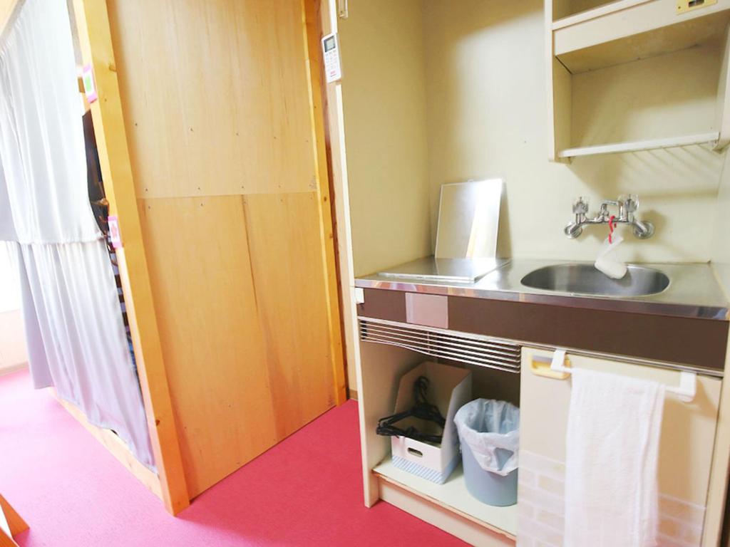 Kuchyň nebo kuchyňský kout v ubytování Hostel J Culture168