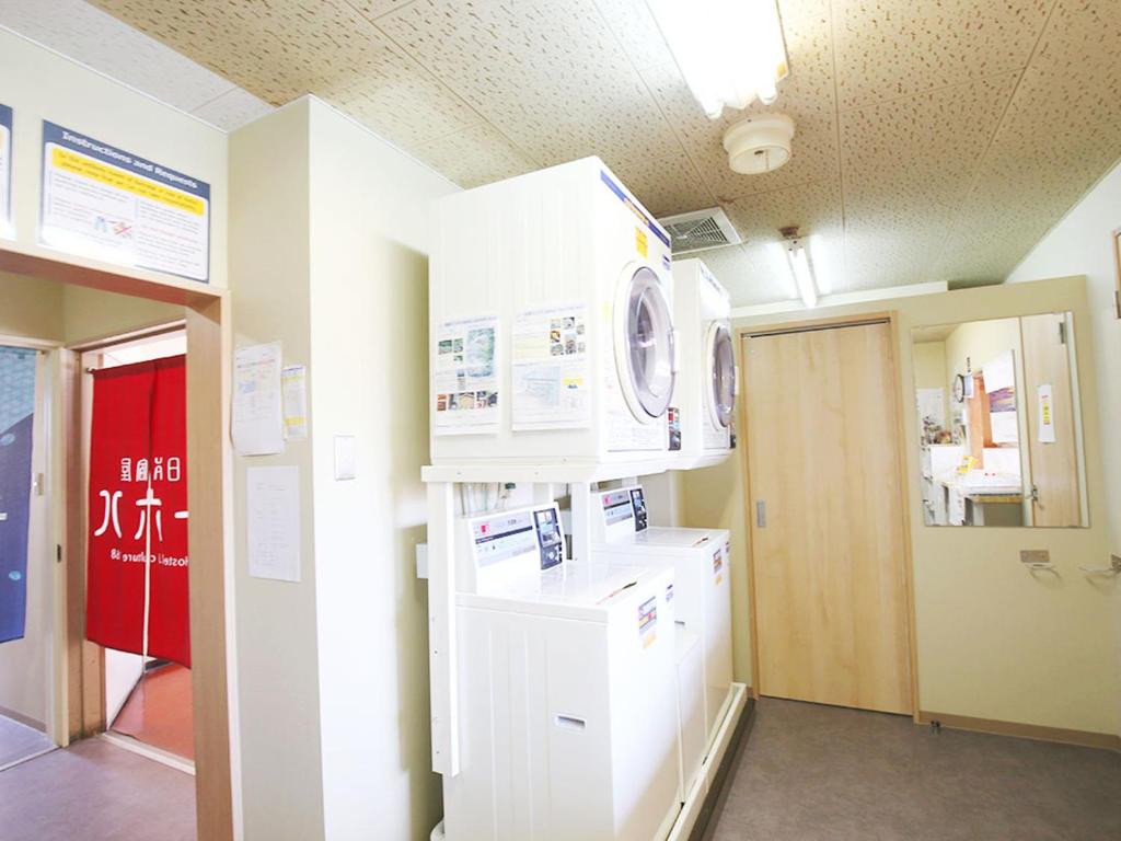 Kuchyň nebo kuchyňský kout v ubytování Hostel J Culture168