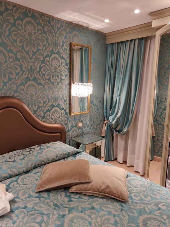Cama ou camas em um quarto em Ca' Marinella