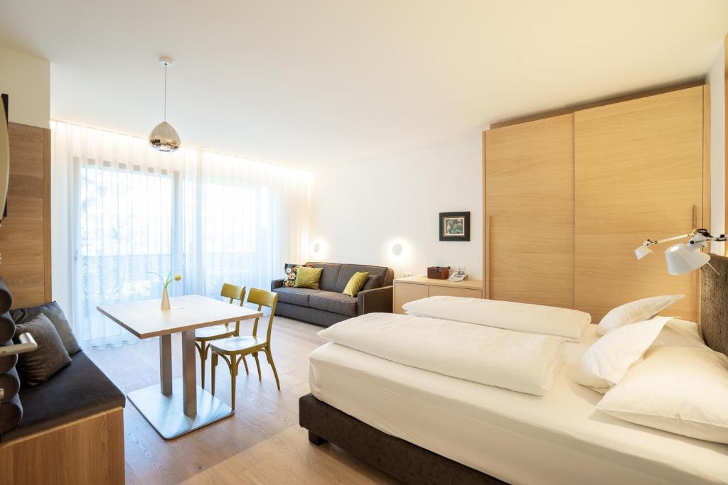 Postel nebo postele na pokoji v ubytování Hotel Gartenresidence Zea Curtis