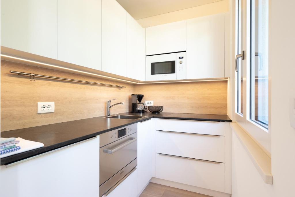 Kuchyň nebo kuchyňský kout v ubytování Hotel Gartenresidence Zea Curtis