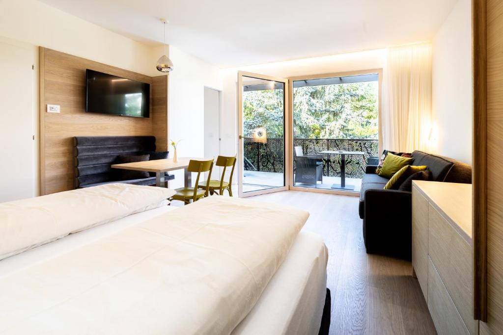 Postel nebo postele na pokoji v ubytování Hotel Gartenresidence Zea Curtis