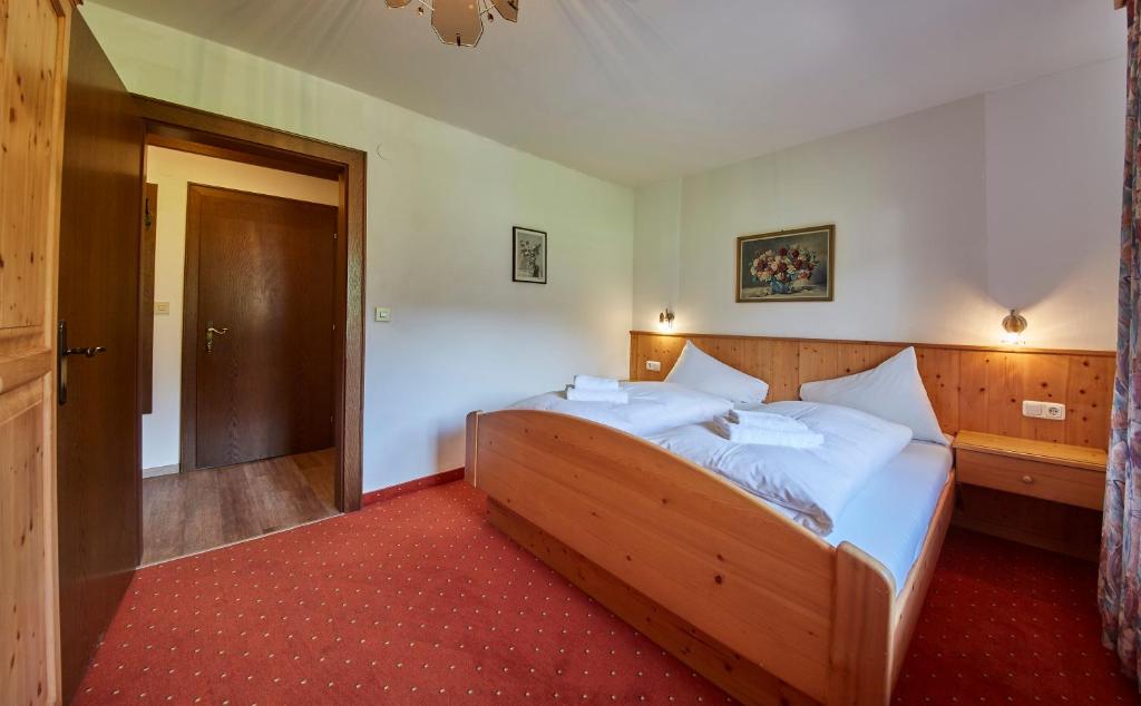 Postel nebo postele na pokoji v ubytování Appartements Christine