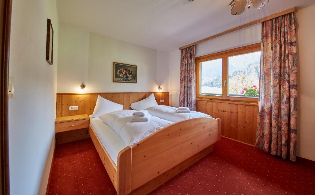 Postel nebo postele na pokoji v ubytování Appartements Christine