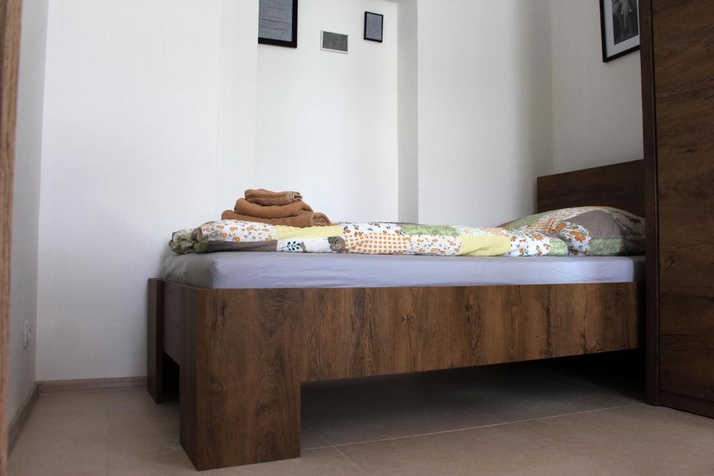 Postel nebo postele na pokoji v ubytování Apartmány v podhradí