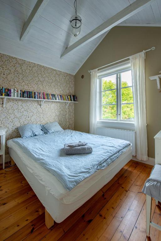 Postel nebo postele na pokoji v ubytování Vaxholm Seaview Cottage